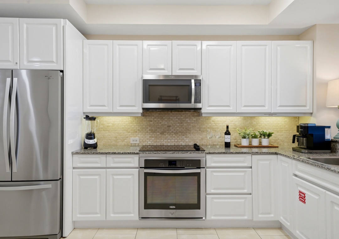 Beach Colony Tower PH1B - Your fully equipped kitchen features stainless steel appliances, ample counter space, and modern fixtures—perfect for preparing meals at your leisure during your stay.