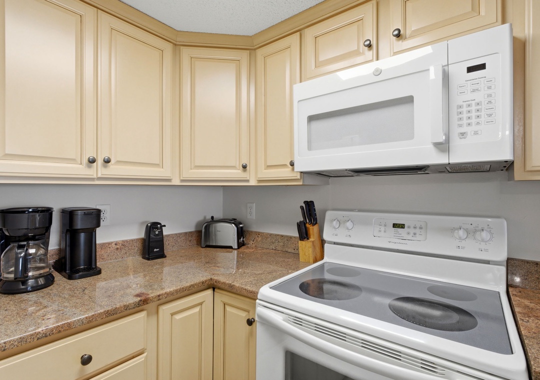 Ocean Breeze E702- Your well-equipped kitchen awaits, featuring modern appliances, ample counter space, and everything you need to prepare meals at your leisure during your stay.