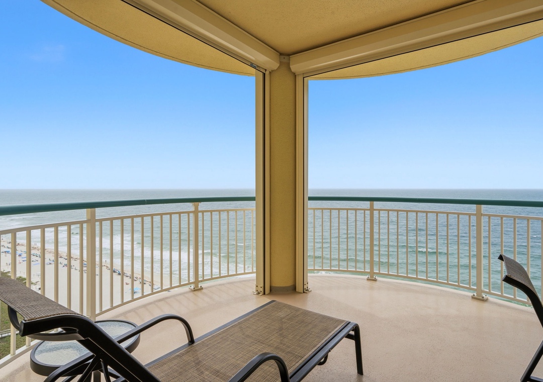 Beach Colony Tower PH1B -Settle into your private balcony chairs and let the endless ocean horizon melt your stress away—pure coastal serenity at your fingertips.