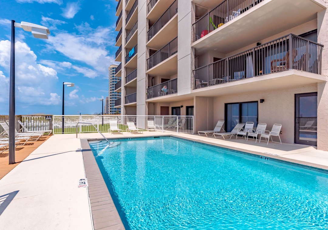 Ocean Breeze East Condos Pool Deck And Chairs