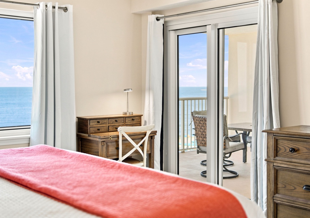 Sandy Key 411- Wake up to endless blue horizons stretching right outside your window. Step onto your private balcony with morning coffee and feel the ocean breeze—your personal sanctuary awaits.