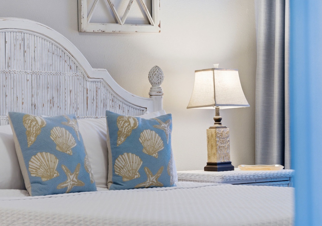 Sink into coastal comfort with soft linens, charming nautical accents, and gentle lighting that turns your evening into pure relaxation.