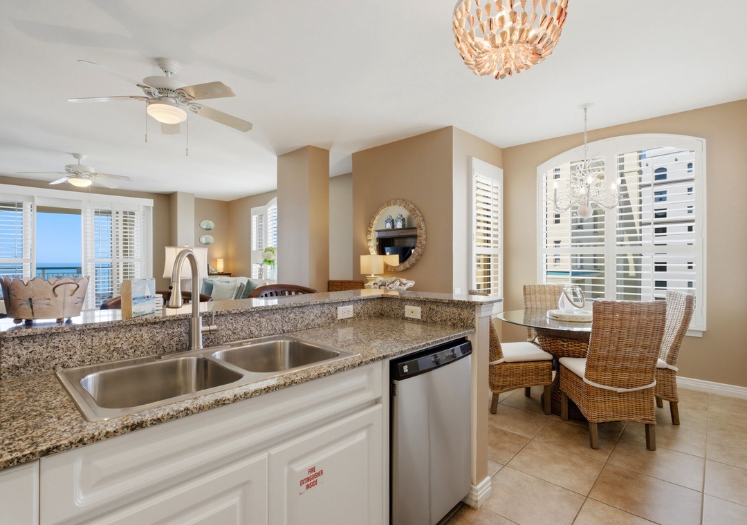 Beach Colony T PH1D- Step into your bright, open-plan coastal retreat where the kitchen, dining, and living areas flow seamlessly together. Granite countertops, stainless appliances.