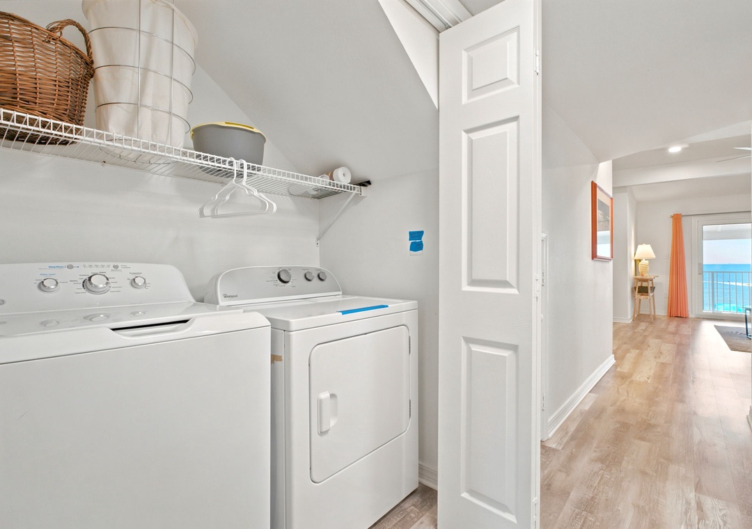 Gulfside Villas 2B- A private washer and dryer keep your beach wardrobe fresh, while ocean views await just down your sunlit hallway—convenience and coastal living perfectly paired.