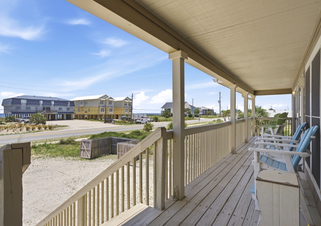 North Lost Key Landing B2- Relax on your private covered porch with comfortable seating, offering coastal breezes and views of the surrounding neighborhood. Perfect for morning coffee or evening unwinding in your beach retreat.