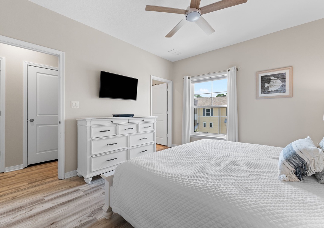 Turtles Nest- Unwind in your restful bedroom with soft neutral tones, ample closet space, and a gentle ceiling fan to keep you comfortable year-round.