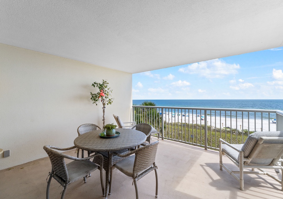 Sandy Key 338- Step out to your private balcony and take in the stunning sea views stretching to the horizon. Relax in cozy wicker seating as ocean breezes sweep across the sand dunes, making every moment feel like a blissful escape.
