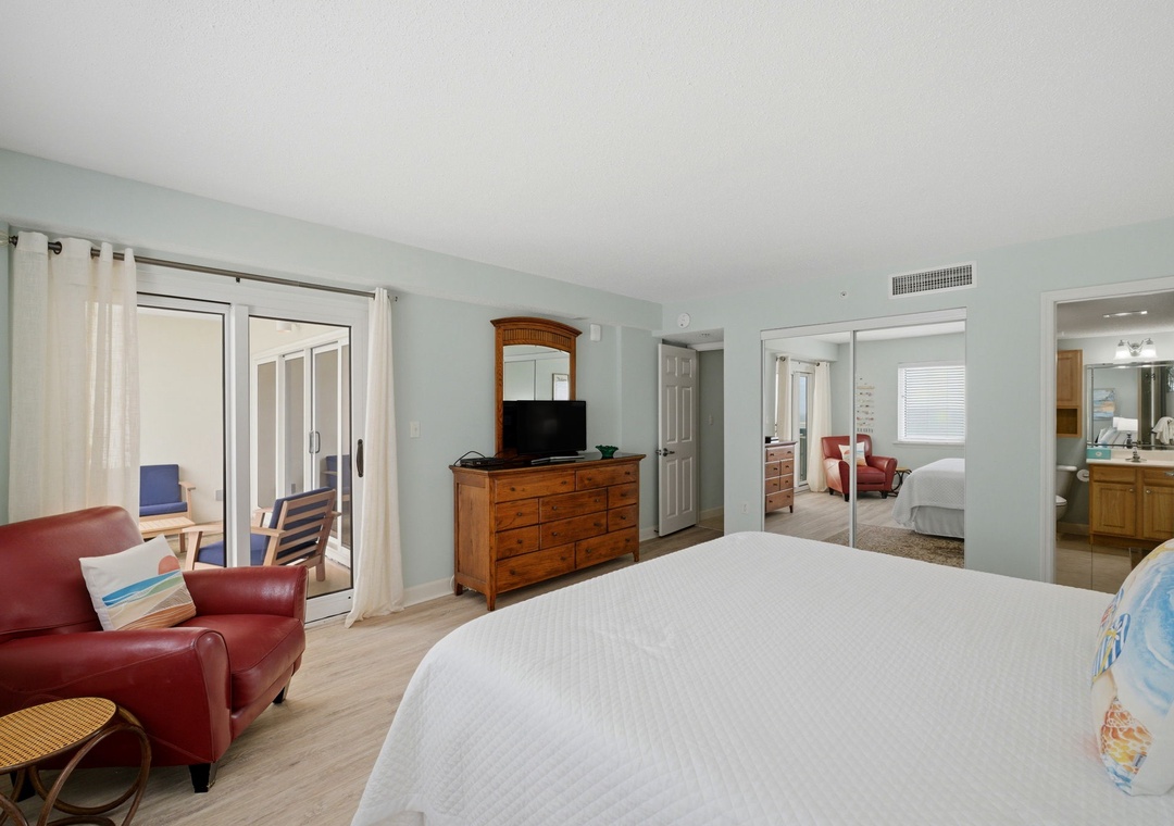 Sandy Key 817- Bedroom 1 with View to TV & Balcony
