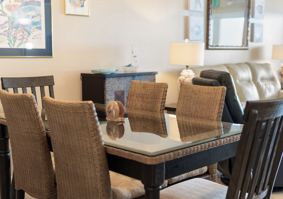 Sandy Key 628- Gather around this inviting dining area where your group can share meals and stories together. The stylish woven chairs and elegant table create the perfect backdrop for your vacation memories.