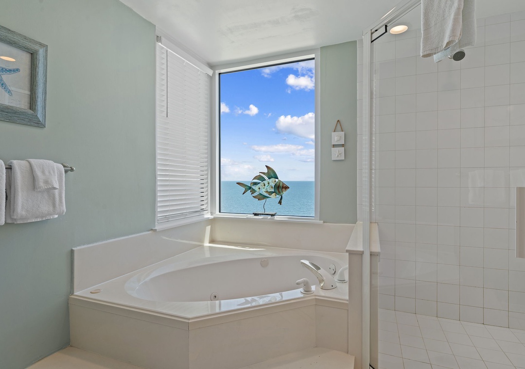 Beach Colony T15B- Soak in your jetted tub while the ocean stretches to the horizon. The walk-in shower and plush towels complete your private seaside sanctuary.