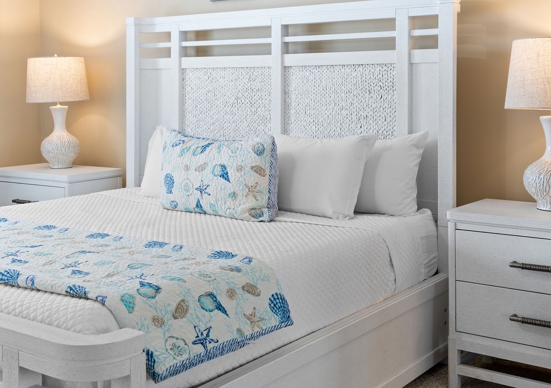 Sandy Key 628- Drift off to sleep in this bright coastal bedroom with beach-inspired linens and thoughtful nautical touches that bring the shore right to your doorstep.