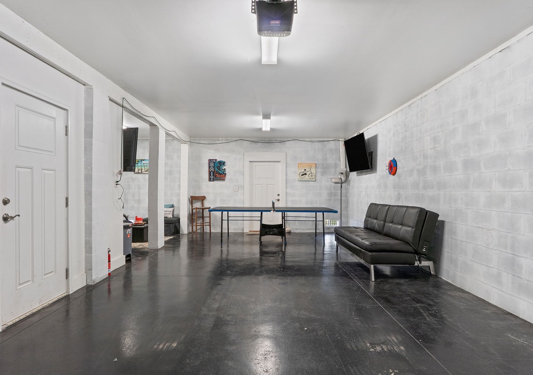 Saltwater & Sunsets- Your own game room awaits with ping pong and a futon for lounging between matches—perfect for friendly competition or unwinding after exploring.