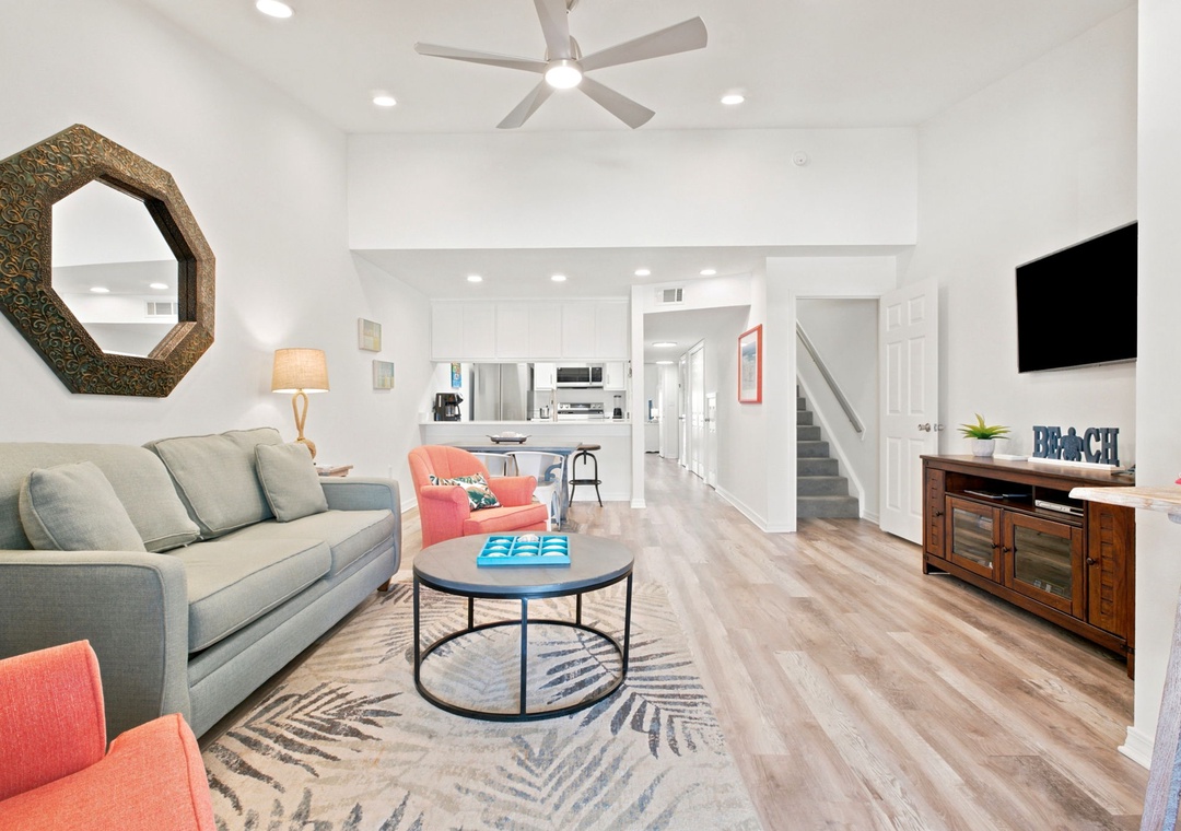 GulfsiStep into your bright, open living space where natural light flows freely and comfortable seating invites you to relax. You'll love the thoughtful coastal touches and seamless flow into your full kitchen, perfect for unwinding after beach adventures