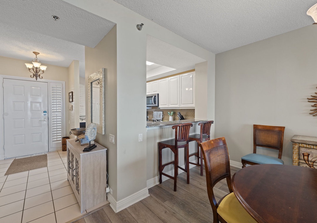 Beach Colony T15B- Step inside and feel right at home in this bright, open space where dining and relaxing flow naturally together. The kitchen awaits your culinary adventures while comfortable seating invites you to unwind after exploring.