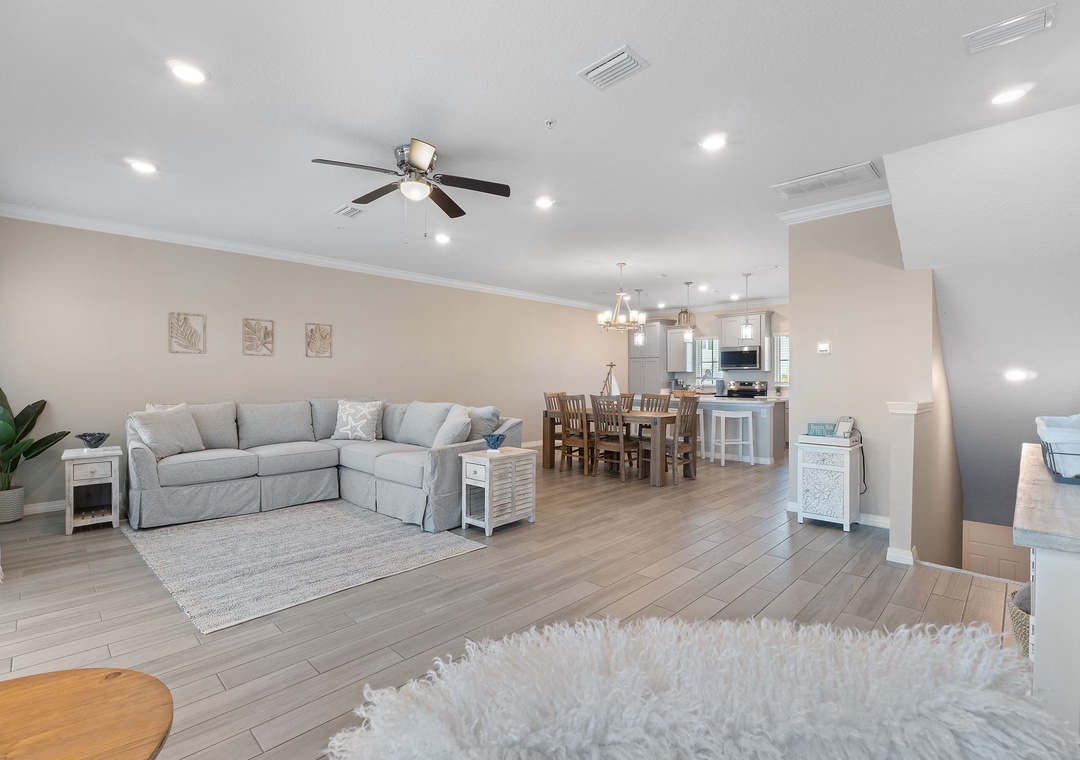 Saltwater & Sunsets- Sink into this open living space where soft neutrals and natural light create an inviting retreat. Your family dinners and movie nights await in this airy, beautifully styled home.