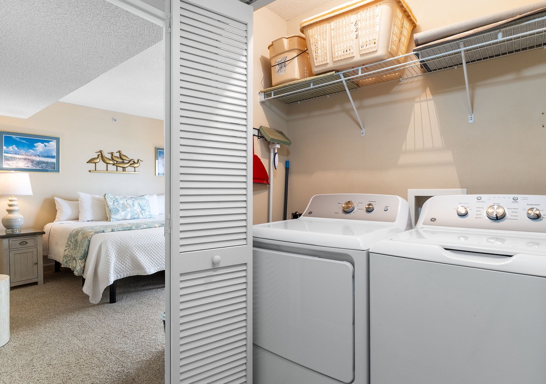 Sandy Key 628- Your own in-unit washer and dryer make packing light easy, while a cozy bedroom retreat awaits just beyond the laundry nook.