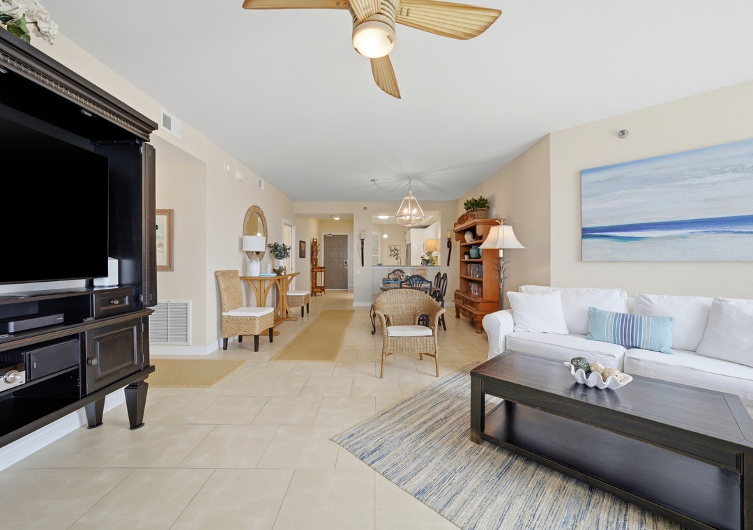 Beach Colony Tower PH1B -Step into your bright coastal retreat, where airy ceilings, beachy decor, and an open layout invite you to unwind and feel instantly at home.