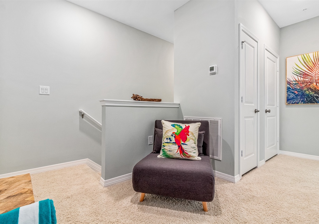 Lost Key The Macaw House Chair at top of Stairs