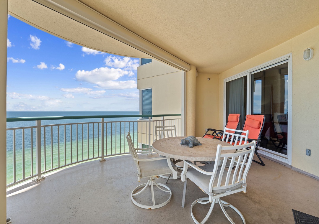 Beach Colony T15B- Step onto your private balcony and breathe in the salt air—your breakfast table awaits with stunning Gulf waters stretching to the horizon, inviting you to unwind in paradise.