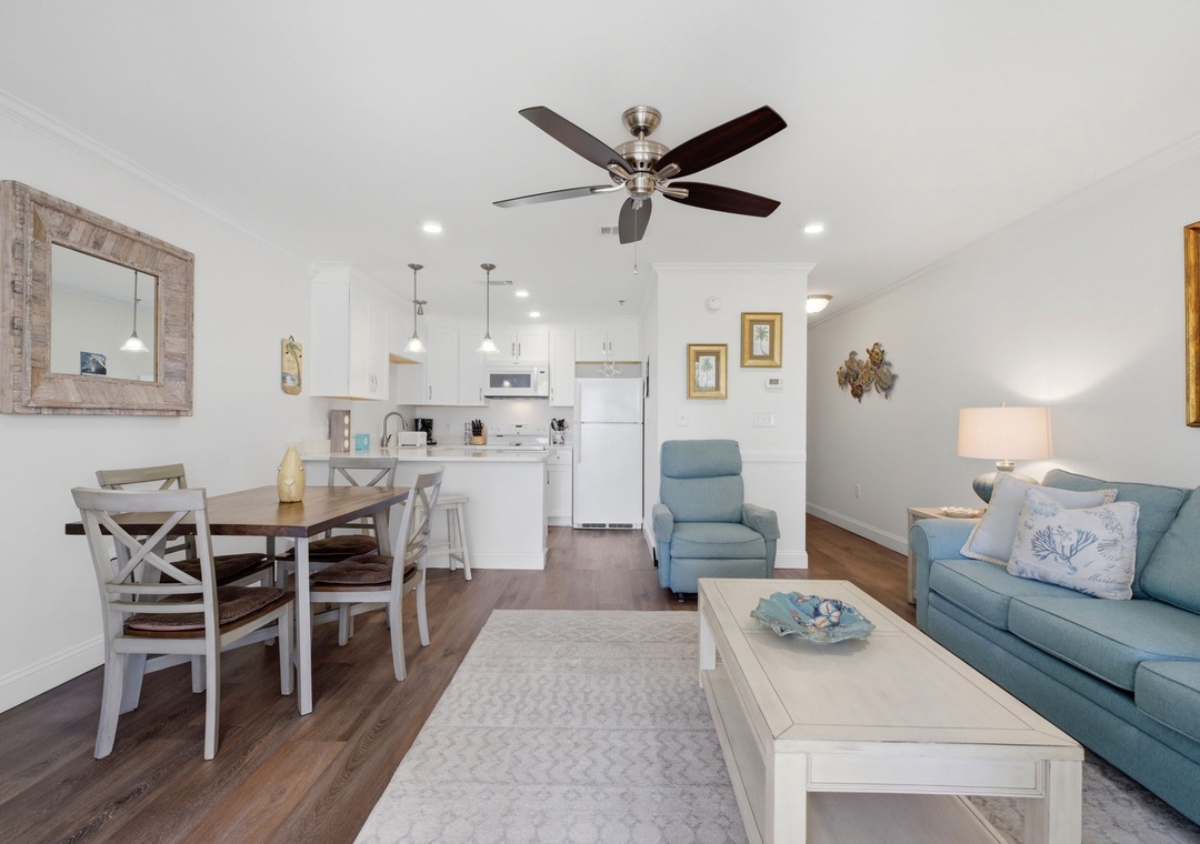 Grand Caribbean 305W- Relax in your open living area with coastal accents, a cozy dining spot, and a well-equipped kitchen—everything you need to unwind after a day of adventure.