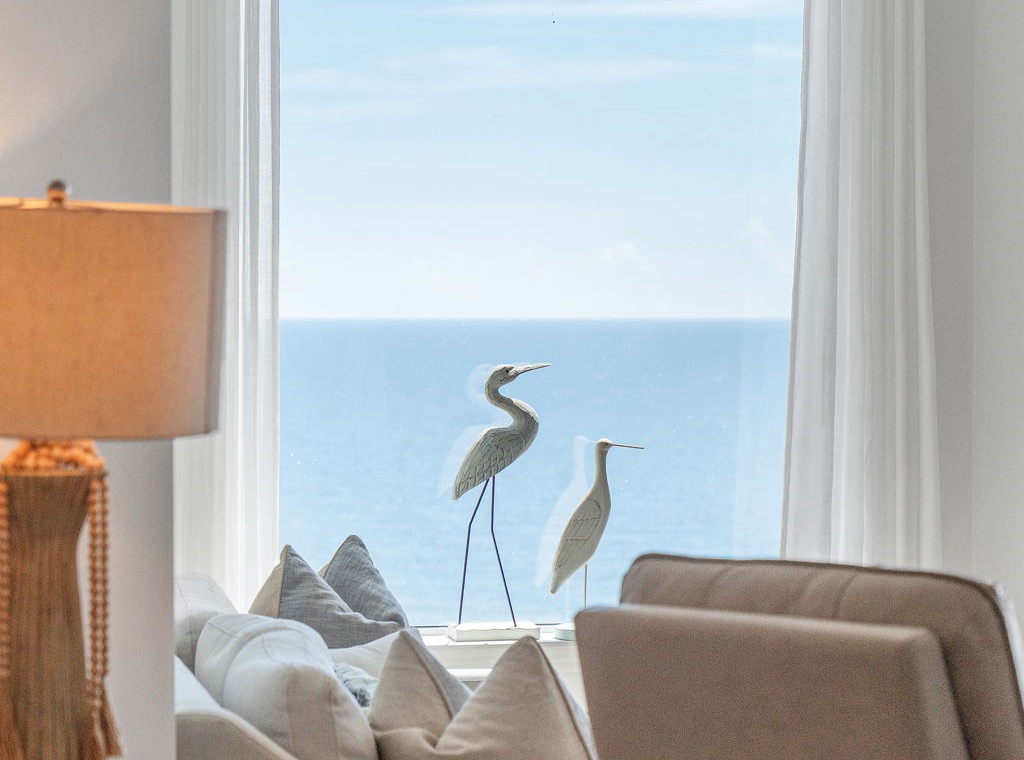 Beach Colony T14B- Wake up to serene ocean views from your cozy living space. Soft coastal breezes, calming hues, and elegant touches make this your peaceful seaside retreat.