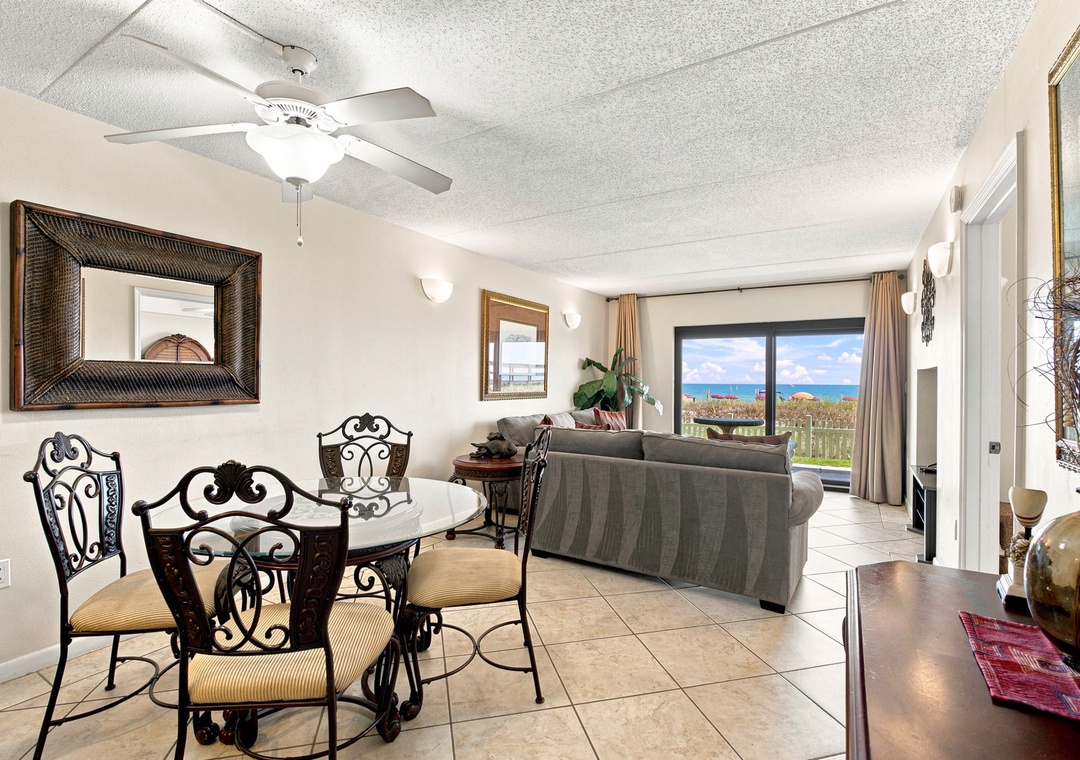 Ocean Breeze W 105- Relax in your bright, open living space with stunning ocean views framing the horizon—perfect for morning coffee or unwinding after beach adventures.