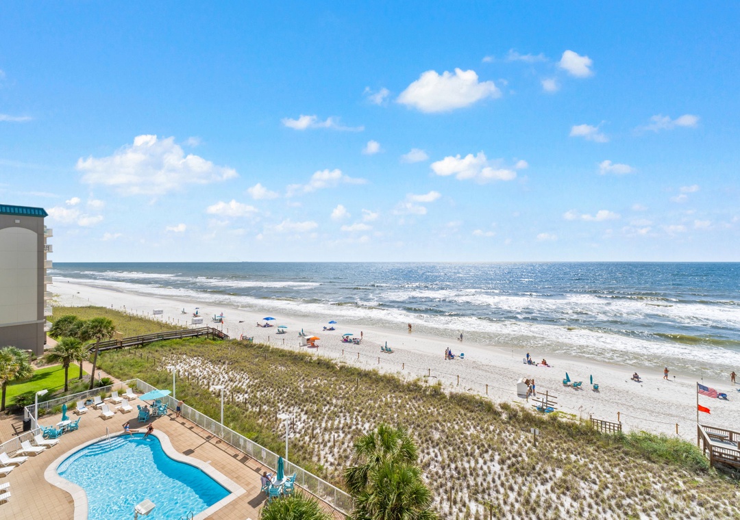 Sandy Key 628- Step outside to an oceanfront paradise with direct beach access, where white sands meet sparkling waves. Relax poolside or stroll through coastal dunes to your private slice of seaside bliss.