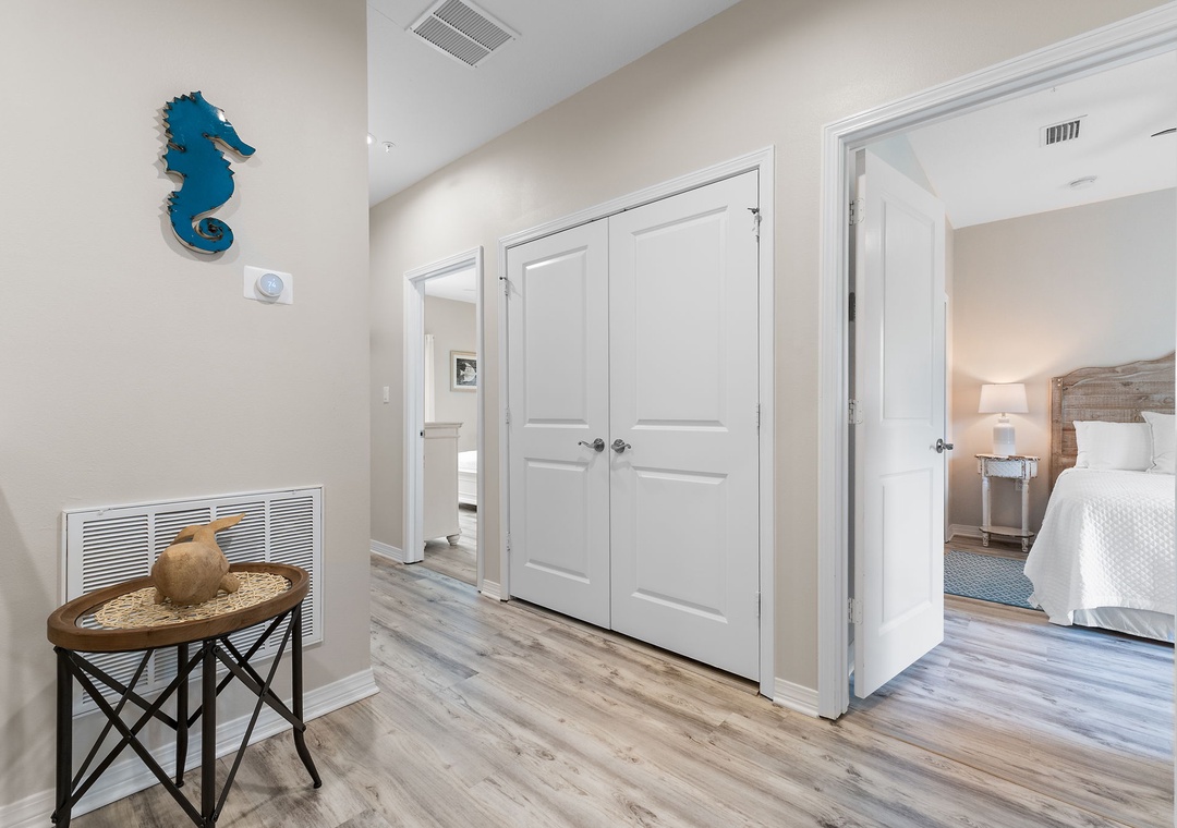Turtles Nest- Step into your coastal retreat—where light-filled hallways and charming beachy touches guide you to restful bedrooms waiting to welcome you home.