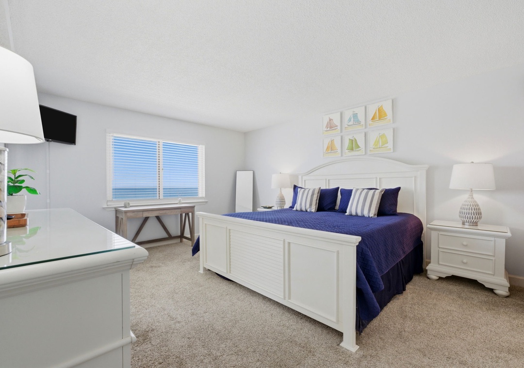 Your serene seaside retreat awaits with coastal decor, plush bedding, and breathtaking ocean views right from your window—perfect for restful mornings and peaceful evenings by the shore.