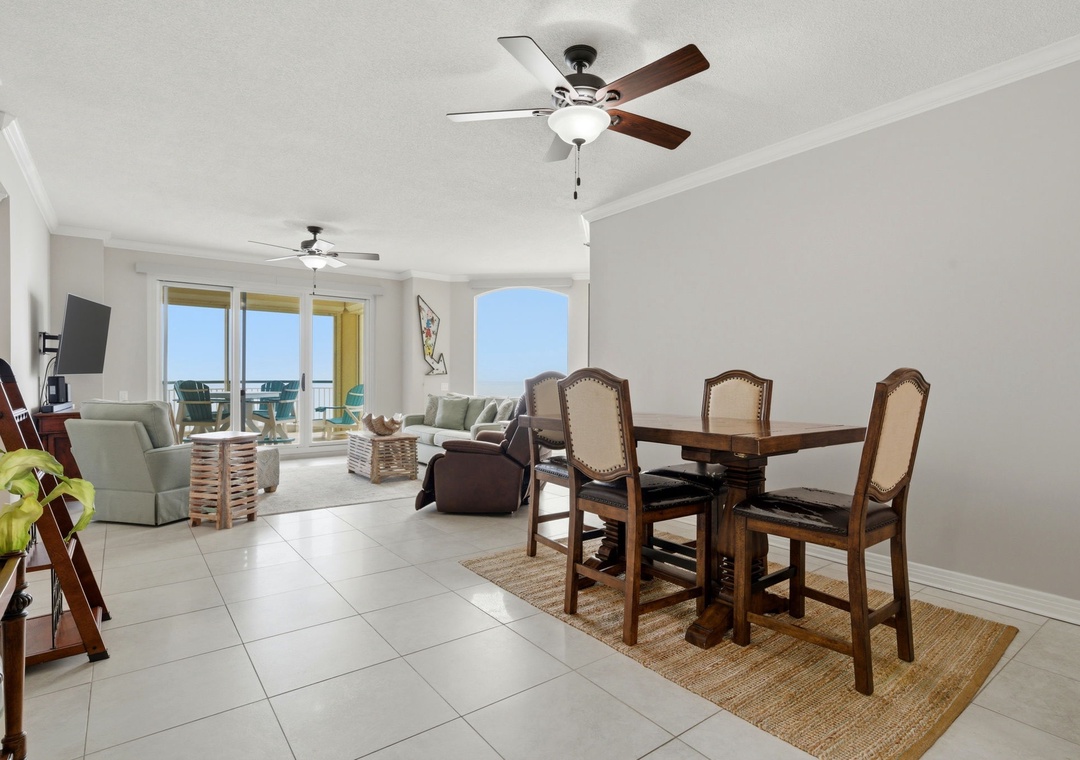Beach Colony West 11C- View of Dining Room to Living Room & Balcony