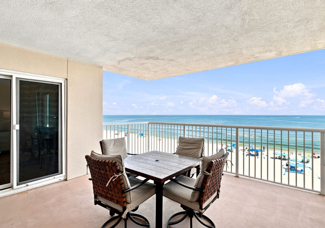 Sandy Key 411- Take your morning coffee or evening meal right here, where the endless ocean and white sand beach stretch out before you—your own private slice of coastal paradise.