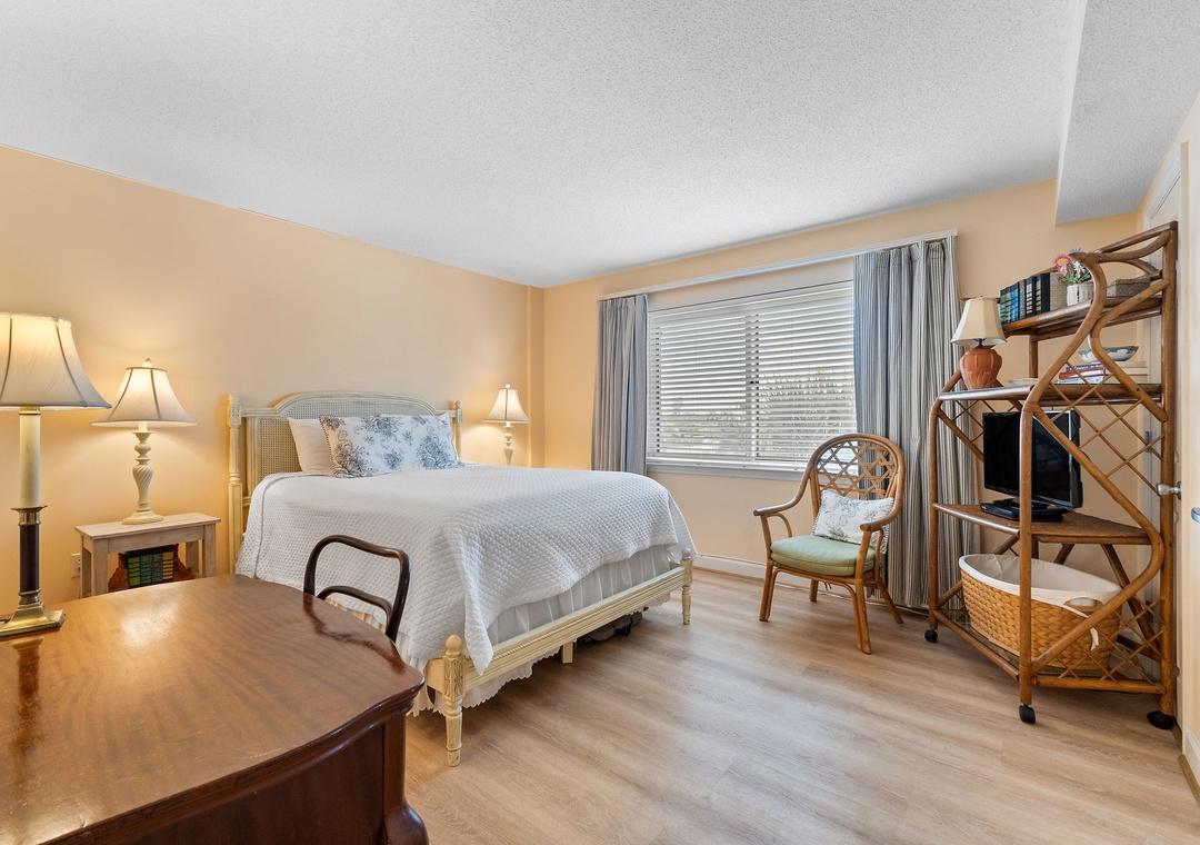 Sandy Key 338- Settle into your cozy bedroom, where warm tones and thoughtful touches create a peaceful retreat. Soft lighting and charming coastal-inspired décor welcome you home after a day of adventure.