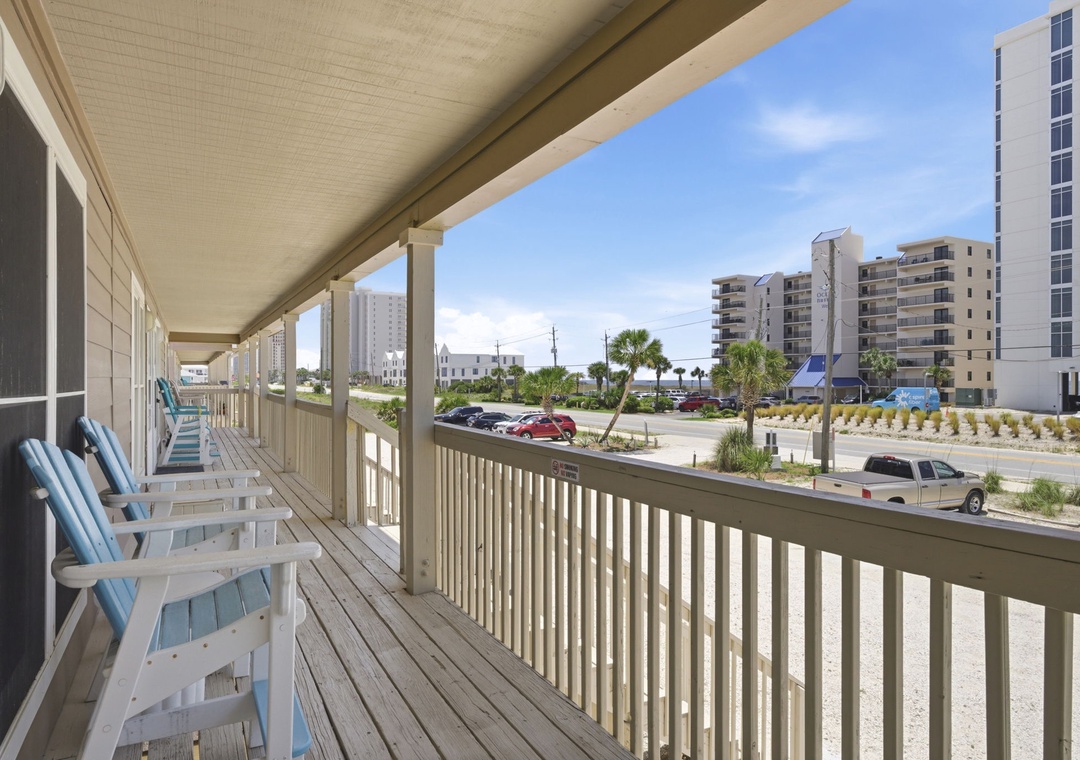 North Lost Key Landing B2- Coastal property located in a beachside neighborhood with nearby high-rise buildings, palm trees, and convenient street access.