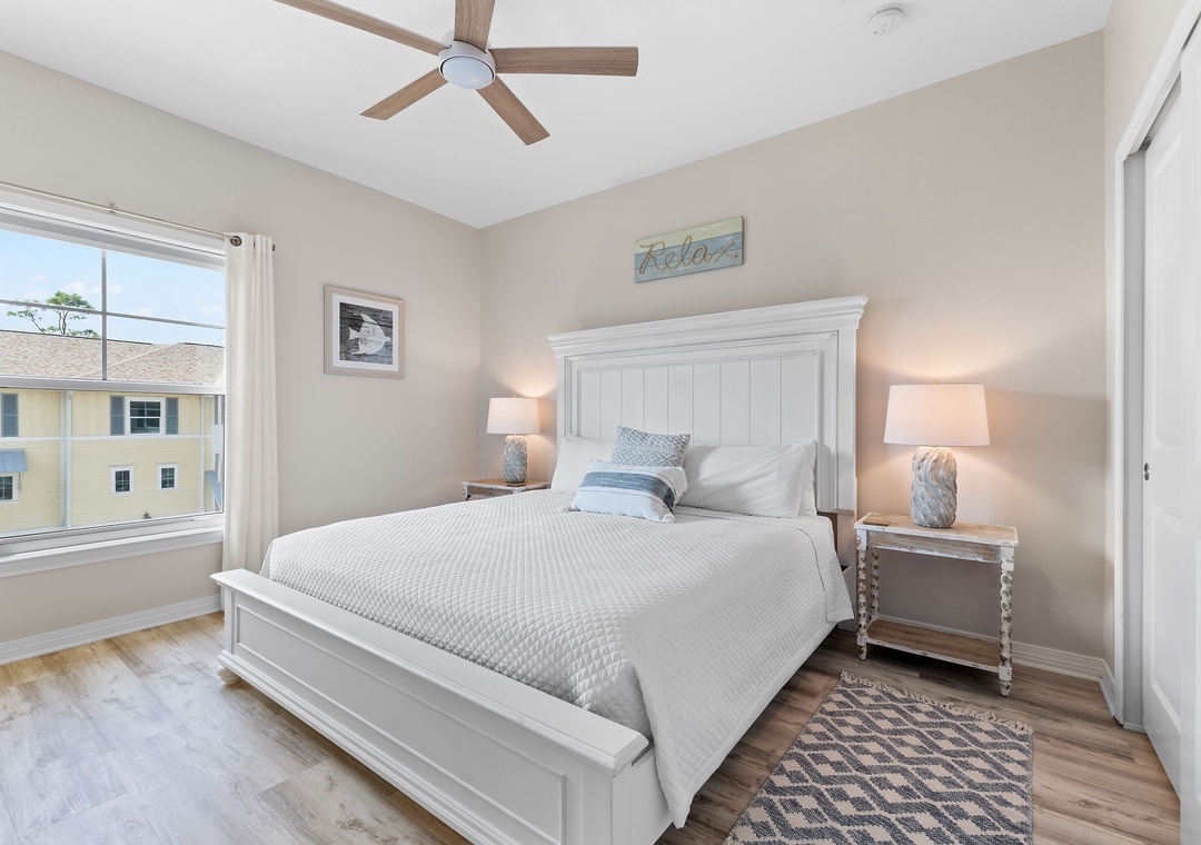 Turtles Nest- Settle into your peaceful bedroom retreat with crisp linens and a ceiling fan keeping you comfortable. Soft lighting and coastal-inspired touches create the perfect atmosphere for unwinding after a day of adventure.