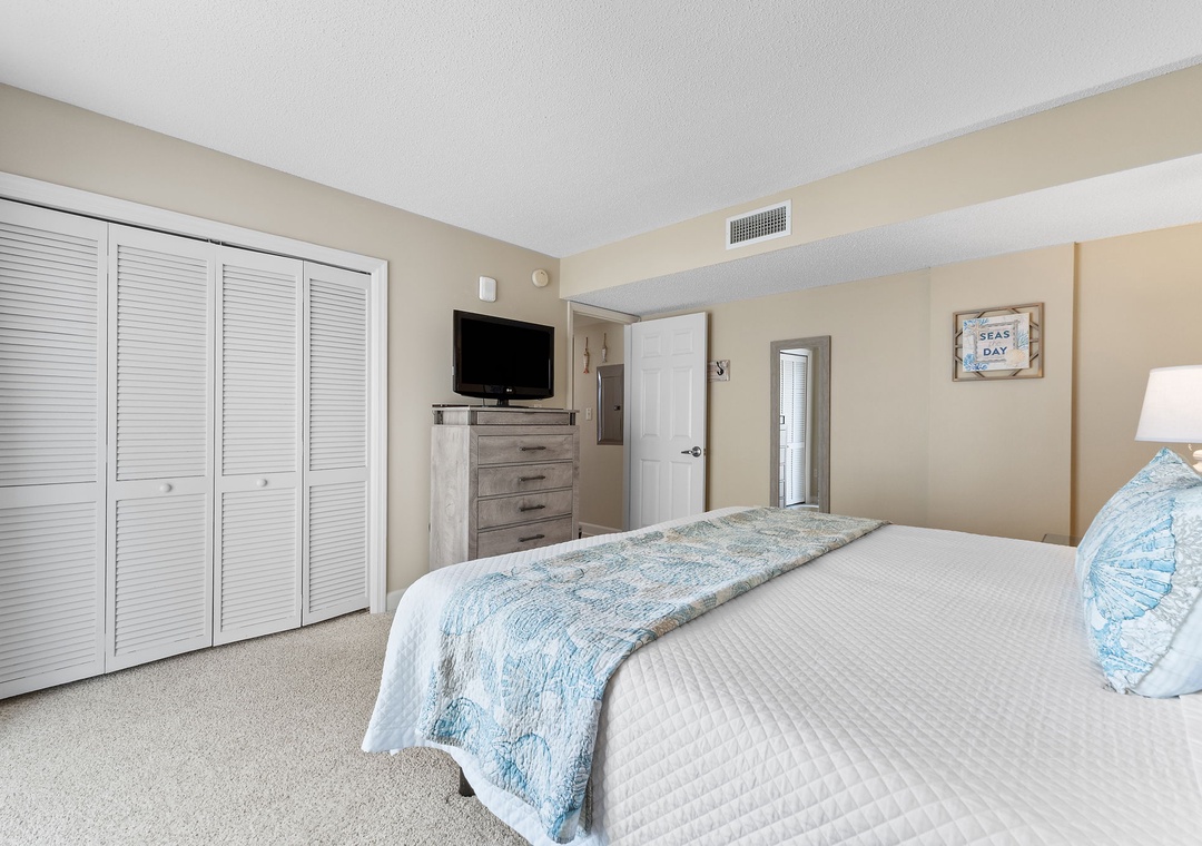 Sandy Key 628- Sink into your plush coastal-themed bed after a day of adventure, with ample closet space and an en-suite bath just steps away.