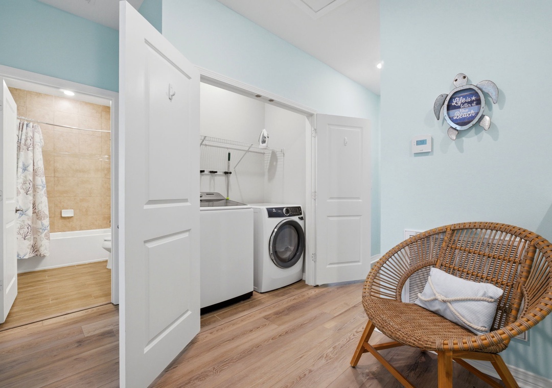 Your in-unit washer means fresh towels and beachwear all vacation long, while the coastal decor and adjacent spa-like bathroom make everyday routines feel special.