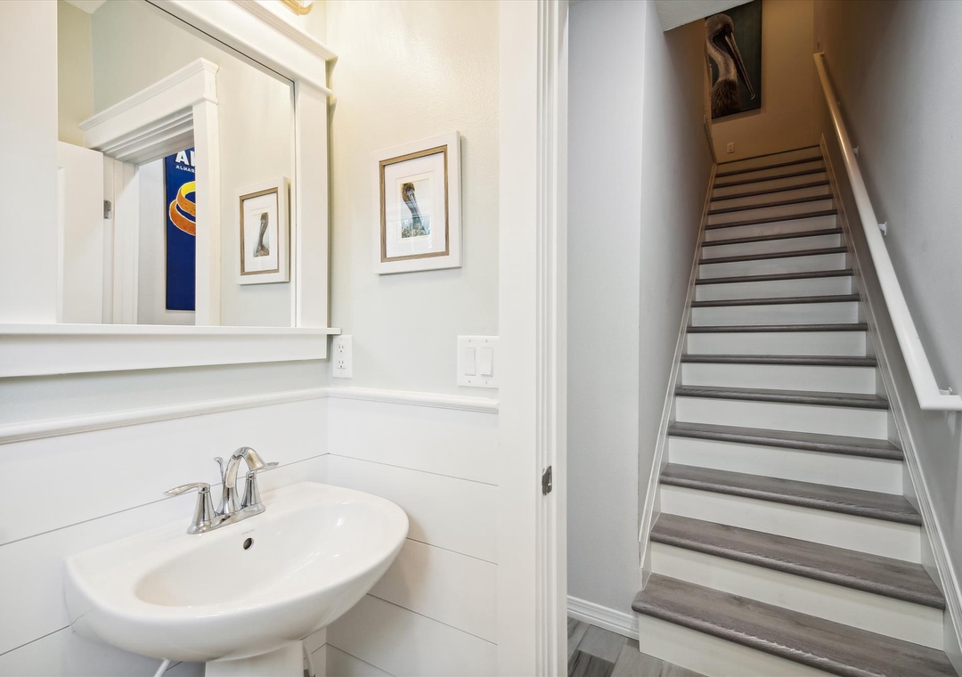 Lost Key Pelicans Paradise Guest Half Bathroom & Stairs