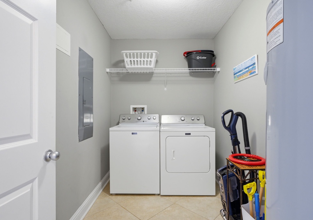 Lighthouse 418- Your very own full-size washer and dryer await in this dedicated laundry room, complete with overhead storage and plenty of space to keep clothes fresh during your stay.