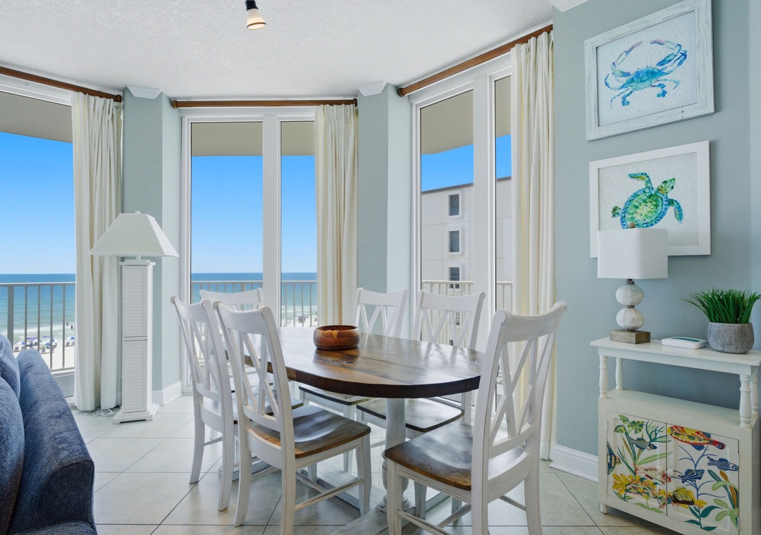 Lighthouse 418- Savor your morning coffee at this beachfront dining table where sea views frame every meal. Coastal decor and soft blue hues create a breezy atmosphere that instantly puts you in vacation mode.
