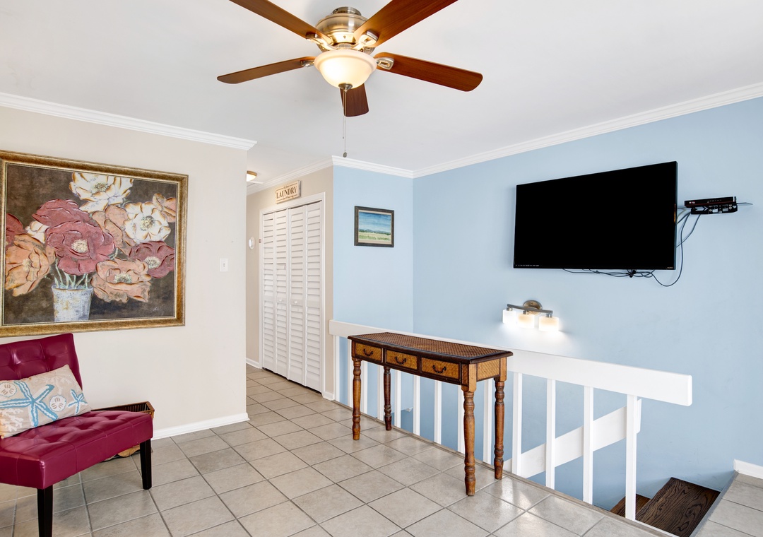 Living Room Area & TV View to Stairs