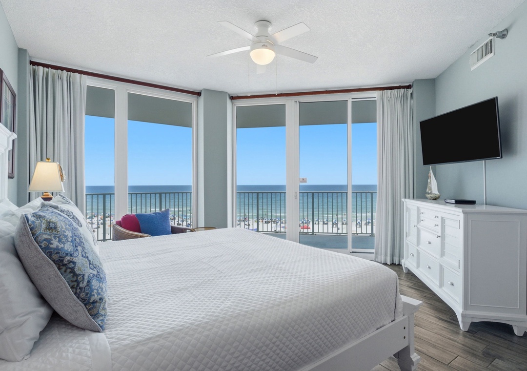 Lighthouse 418- Wake up to endless ocean views from your private balcony. The soothing coastal decor and plush bedding invite you to unwind in this serene beachfront retreat.