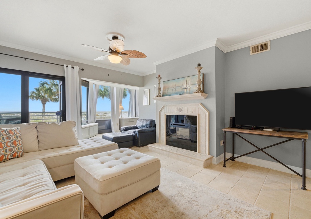 Palm Beach Club 118 - Livingroom View of Fireplace, TV & Sunroom