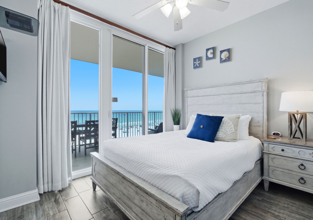 Lighthouse 418- Wake up to sparkling turquoise waters right outside your window. This serene bedroom invites you to drift off to ocean breezes and the gentle rhythm of waves.
