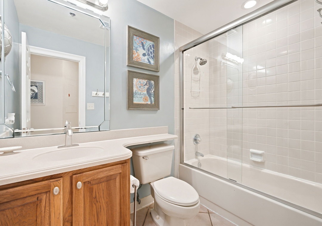 SeaChase 1104C-Step into a beautifully appointed bathroom with crisp tile, a refreshing shower-tub combo, and thoughtful coastal touches that make your daily routine feel like a spa retreat.