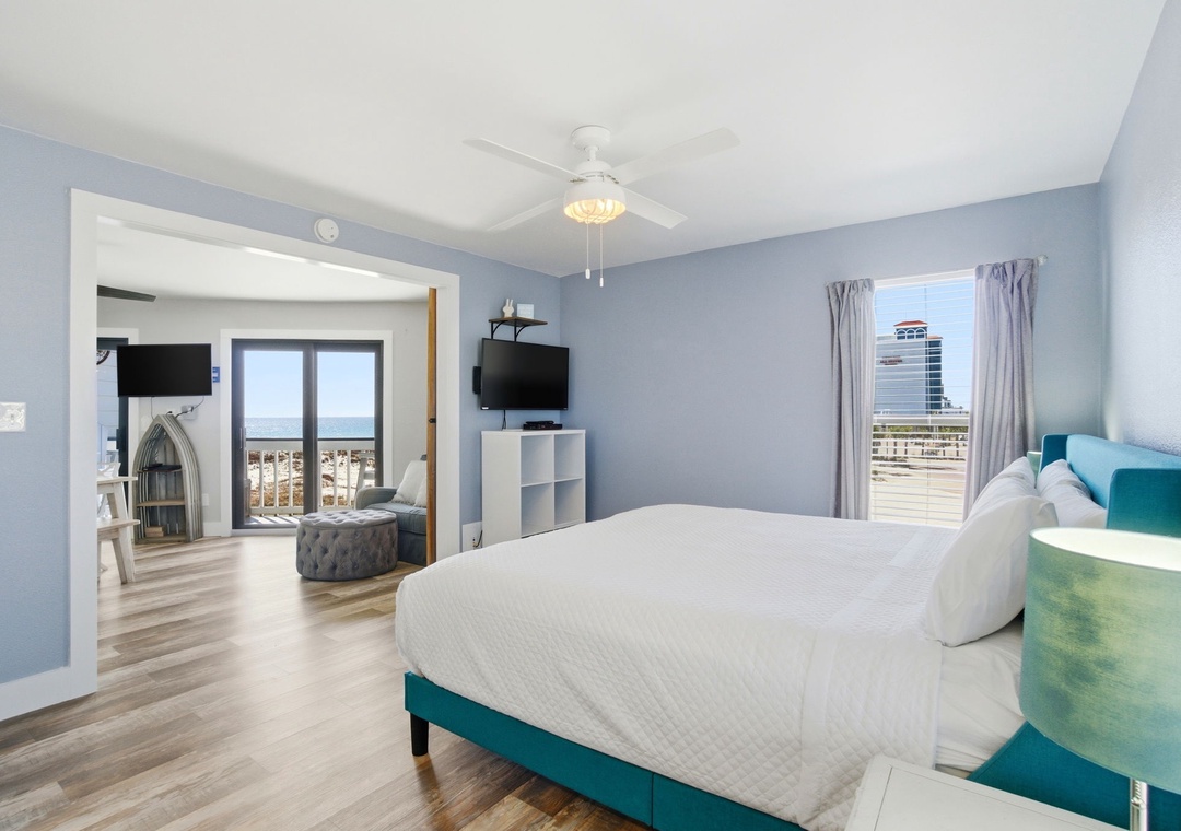 Regatta Condo 201A- Bedroom 1, TV & View to Balcony