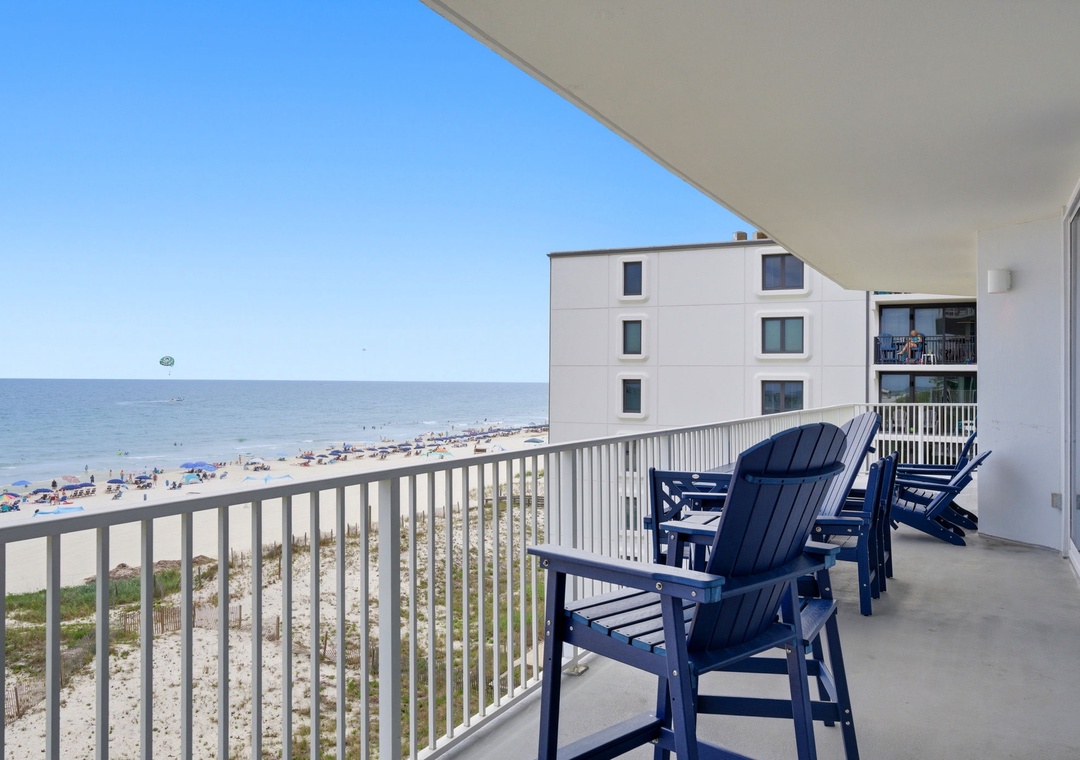 Lighthouse 418- Relax in your private Adirondack chairs and soak in sweeping oceanfront views. Feel the sea breeze as you watch beachgoers and waves from your spacious balcony overlooking the shore.