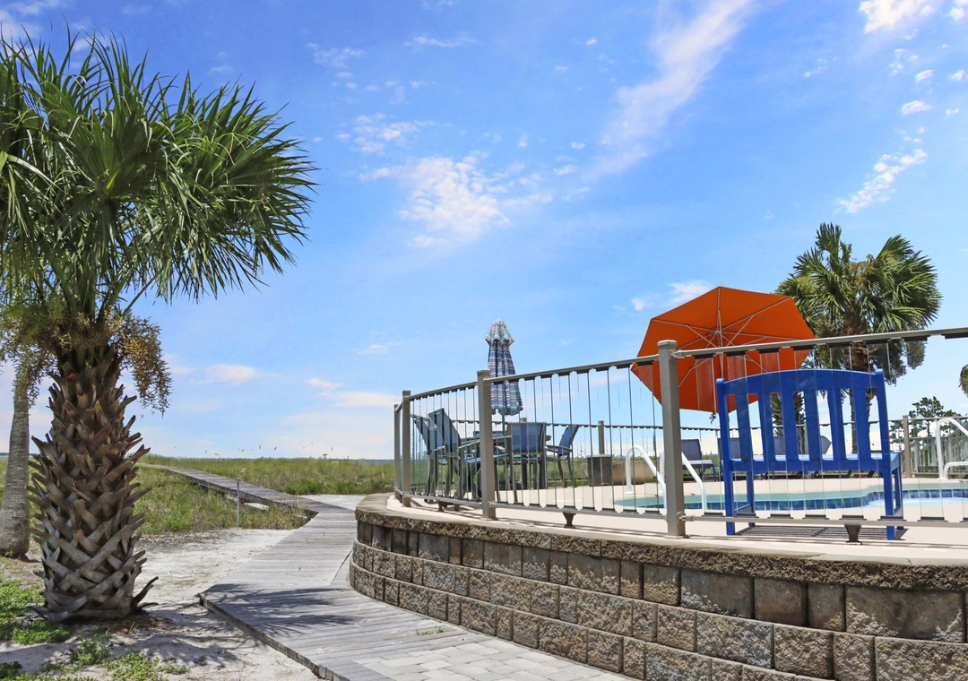 Walkway to Beach Around Pool