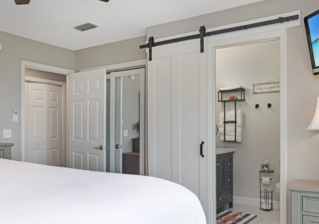 Bedroom 3 with TV and Master Bathroom