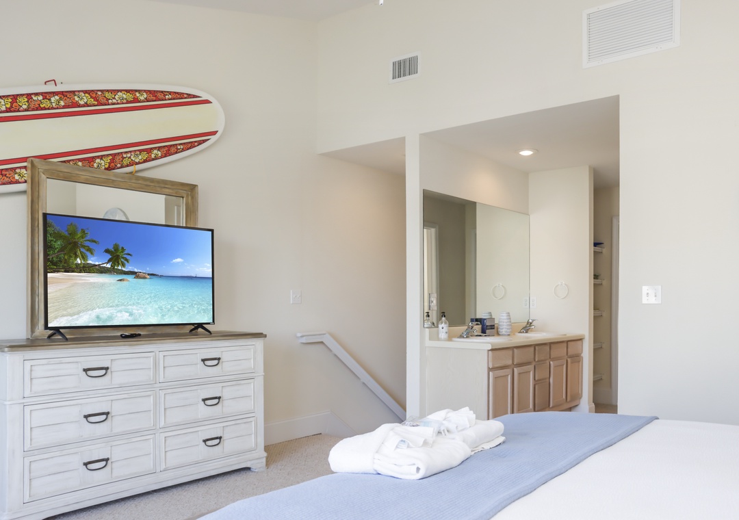 Bedroom 2 with TV and Master Bathroom