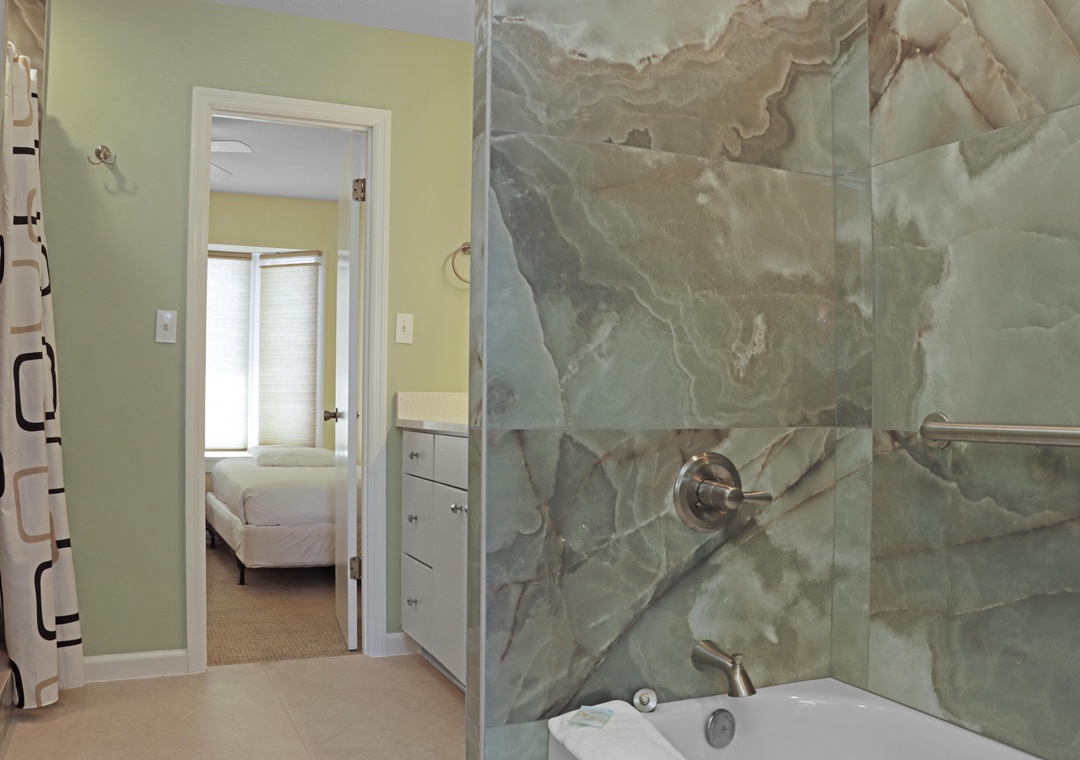 Shared Bathroom with Combo Tub and Shower